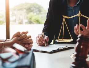 Law should know concept, The lawyer explained to the client to plan the case in court.